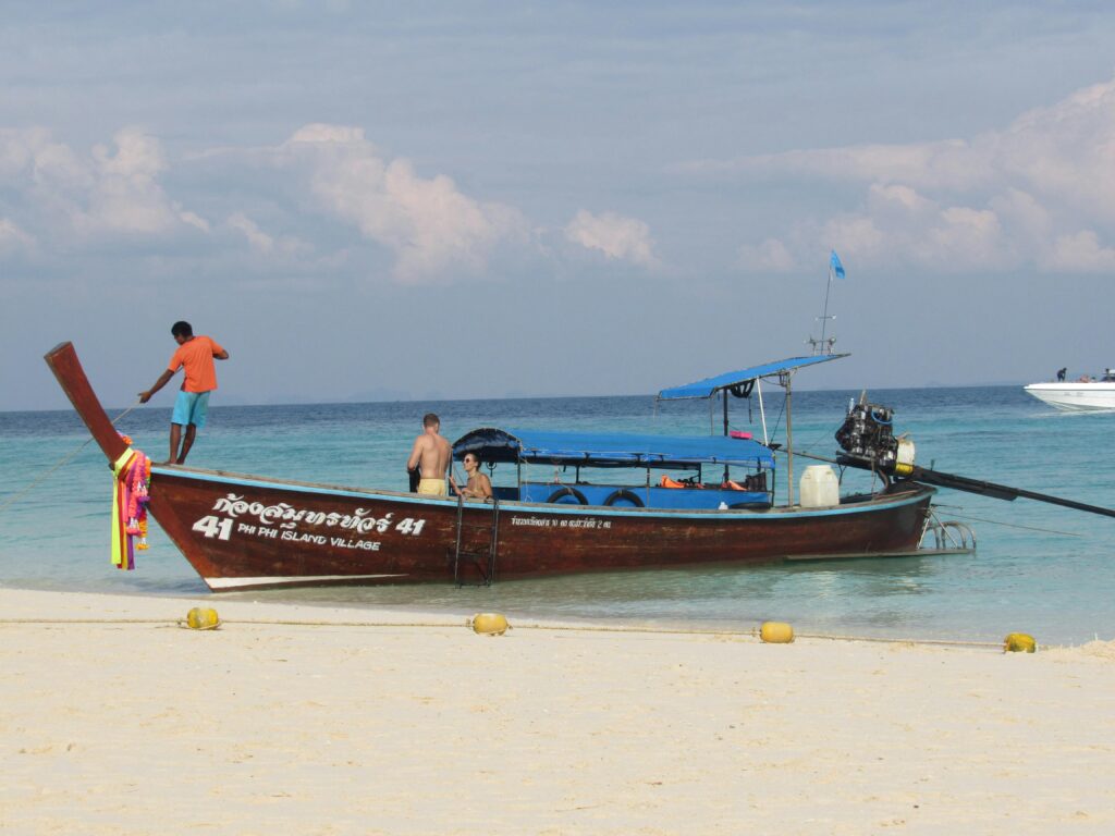 Traditional Long-tail Boat on Phi Phi Island Beach